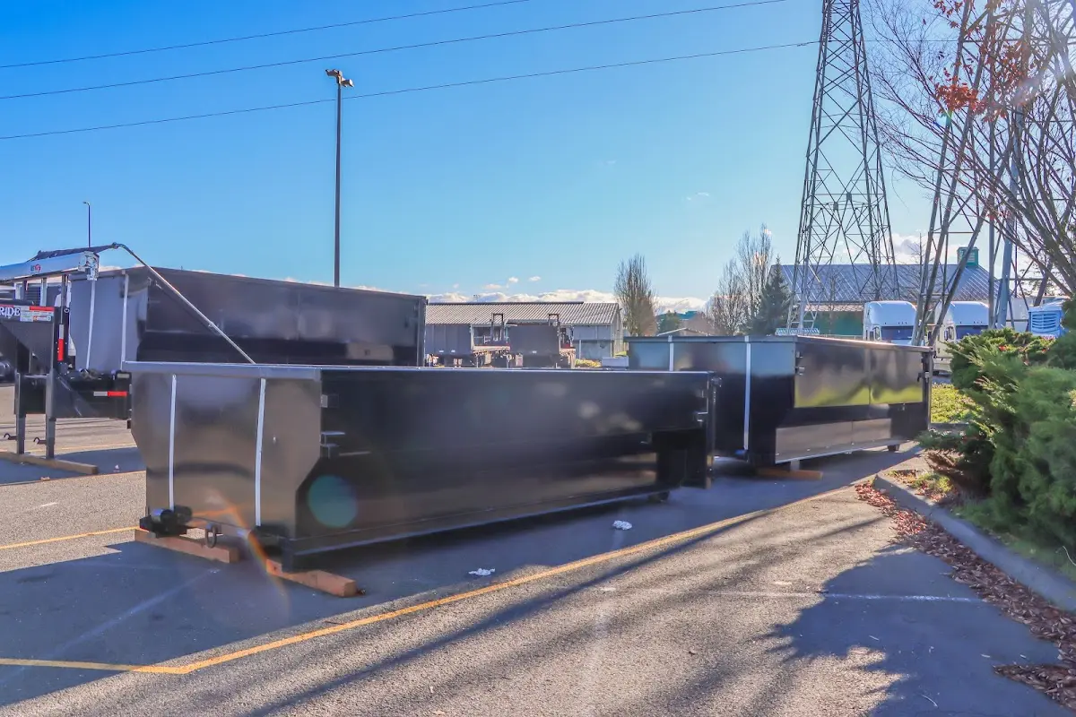 Roll-off dumpster ready for waste disposal at job site for 15 Yard Dumpster Rental in Sky Lake